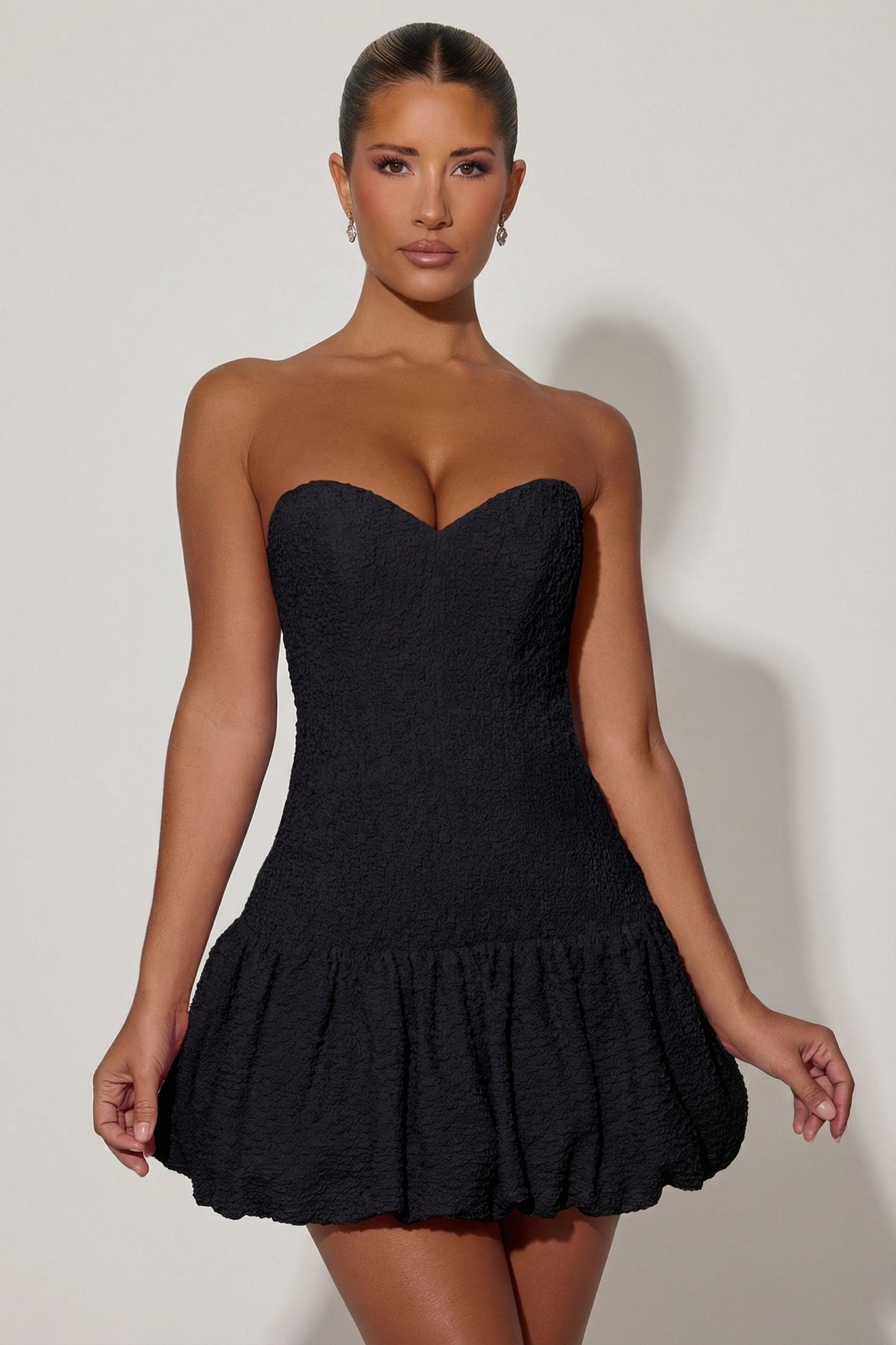 Cut-Out Bubble Hem Corset Mini Dress in Black