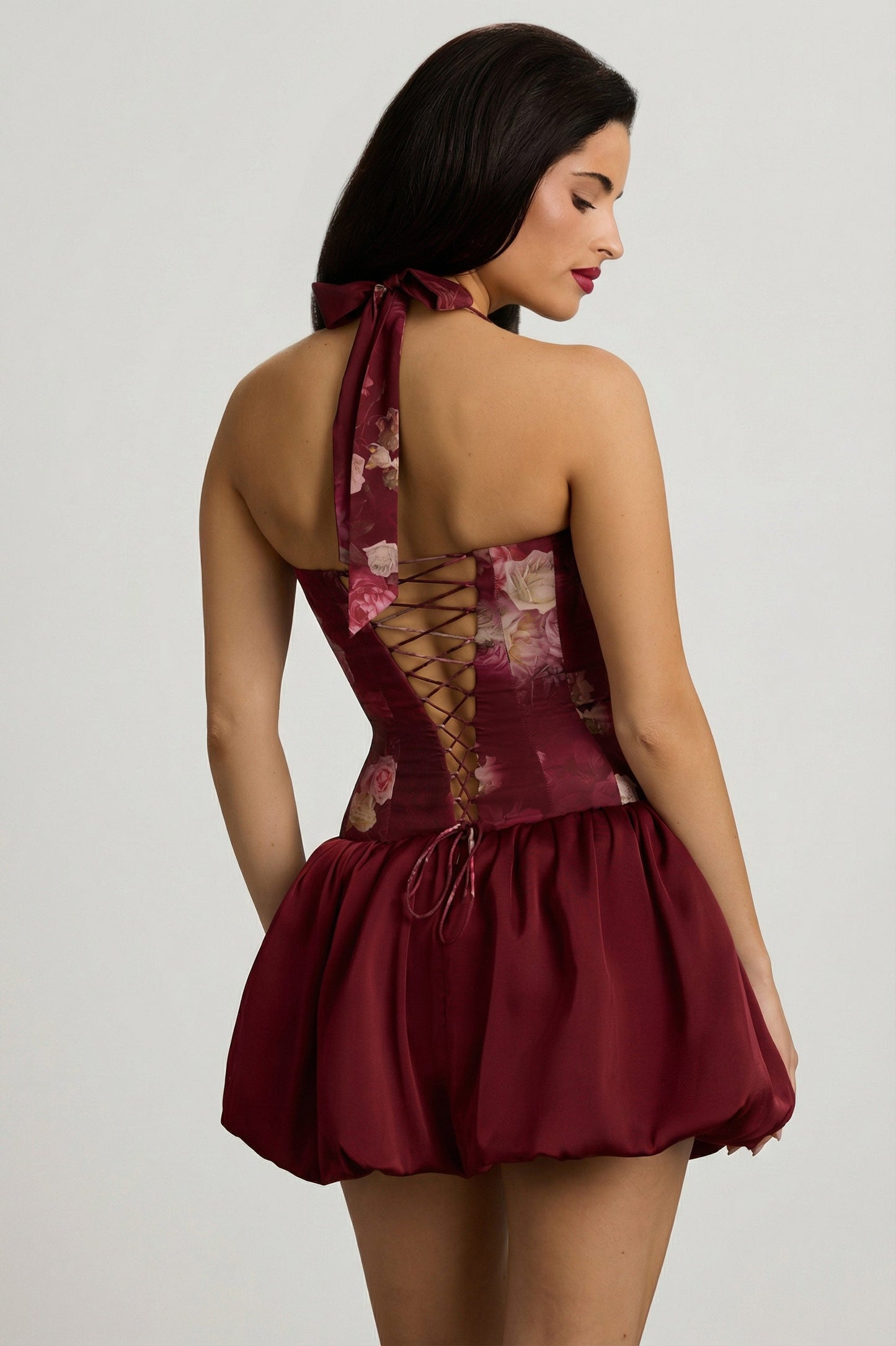 Halterneck Lace-Up Bubble Hem Mini Dress in Maroon Floral Print